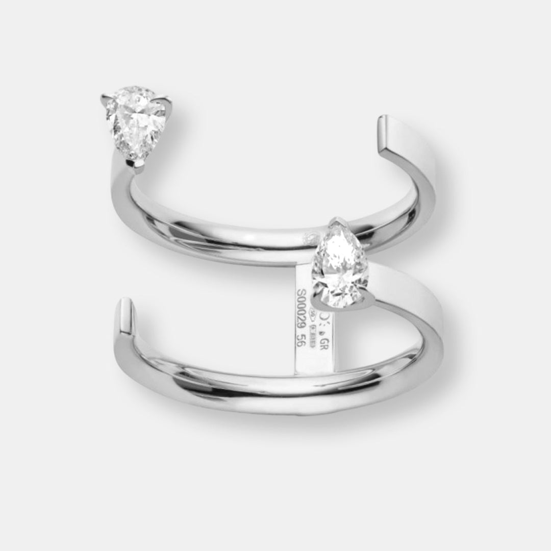 Bague serti sur vide en or blanc avec 2 diamants taille poire