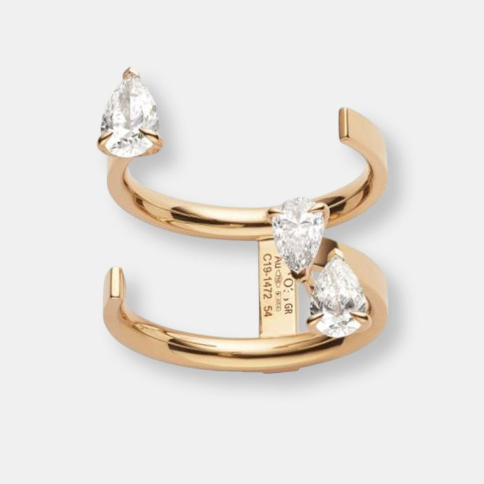 Bague serti sur vide en or rose avec 3 diamants taille poire