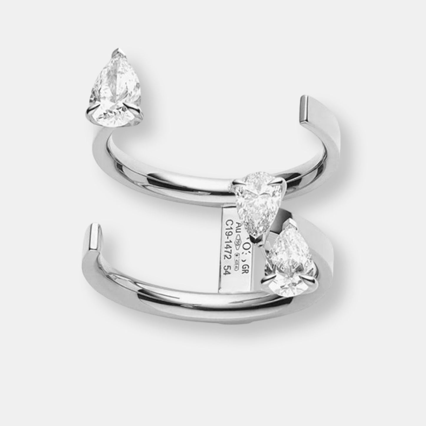 Bague serti sur vide en or blanc avec 3 diamants taille poire