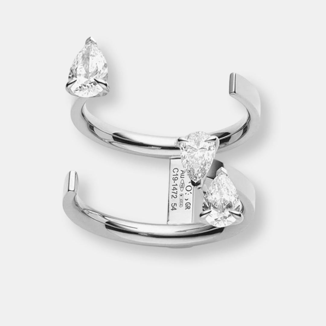 Bague serti sur vide en or blanc avec 3 diamants taille poire