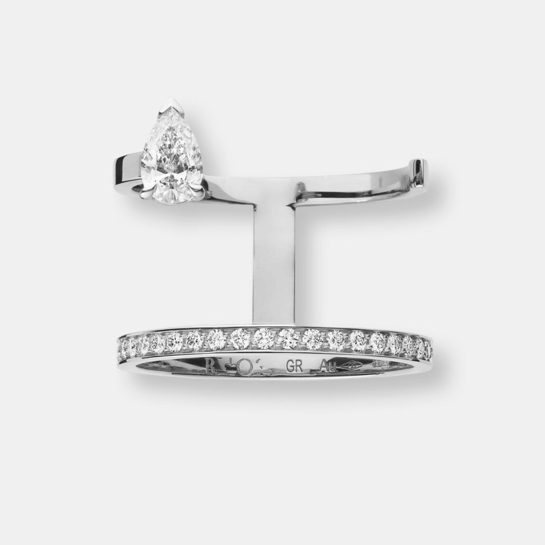 Bague serti sur vide en or blanc pavée de diamants