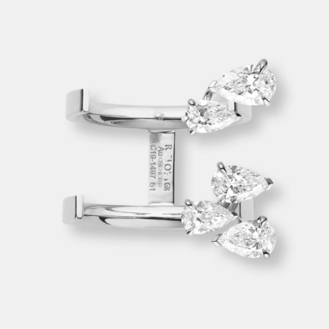 Bague serti sur vide en or blanc avec 5 diamants taille poire