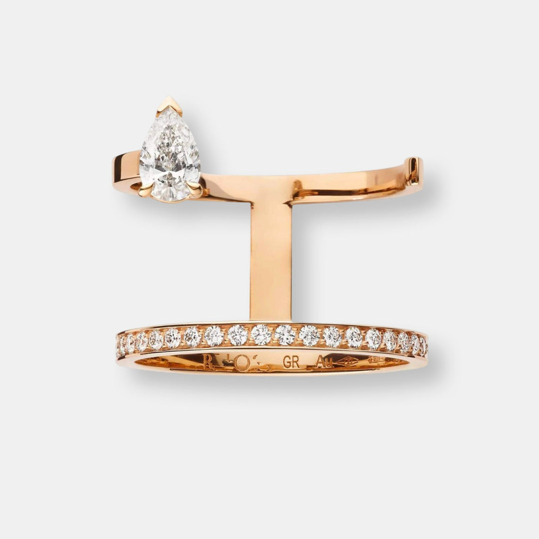 Bague serti sur vide en or rose pavée de diamants