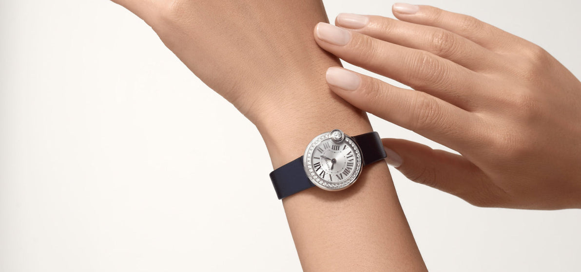 Montre ballon balnc de cartier